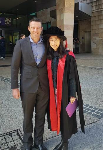 PhD graduate Gloria Wang with prof Jason Roberts